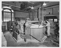 Student using paper machine in Paper Mill